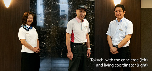 Tokuchi with the concierge (left) and living coordinator (right)