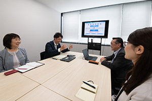 A meeting in the Marketing Support Office